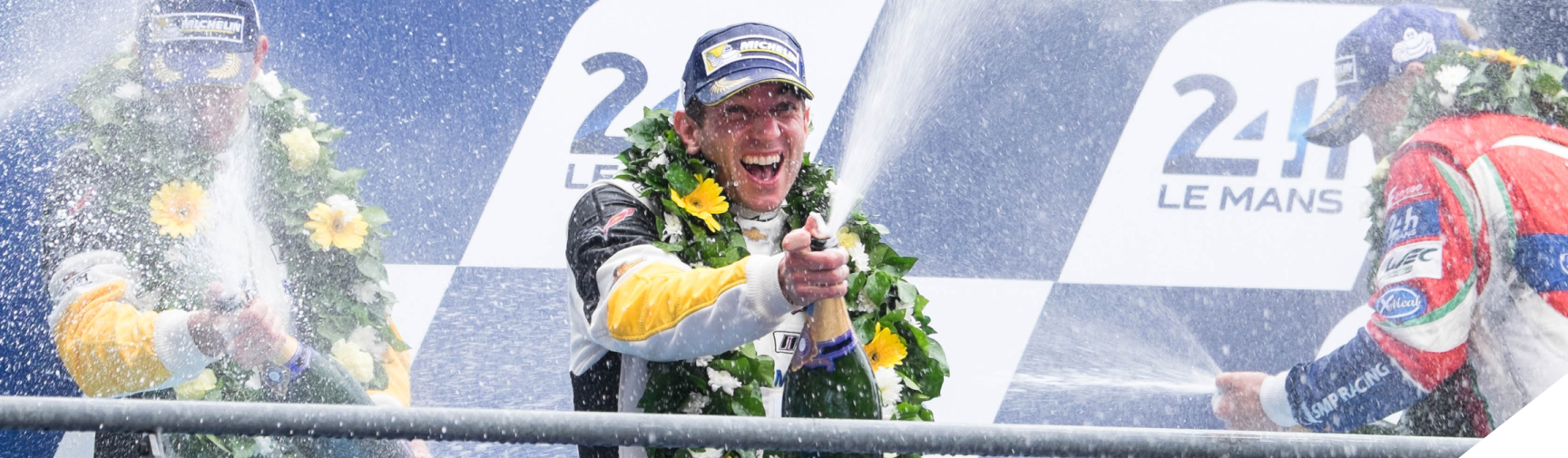 Oliver Gavin spraying champagne