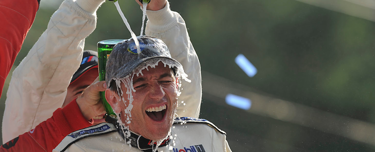 Oliver Gavin being doused in champagne