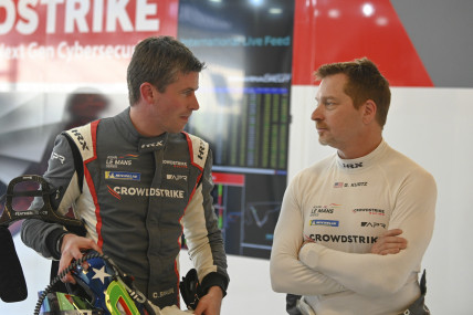 Colin Braun talking to team mate George